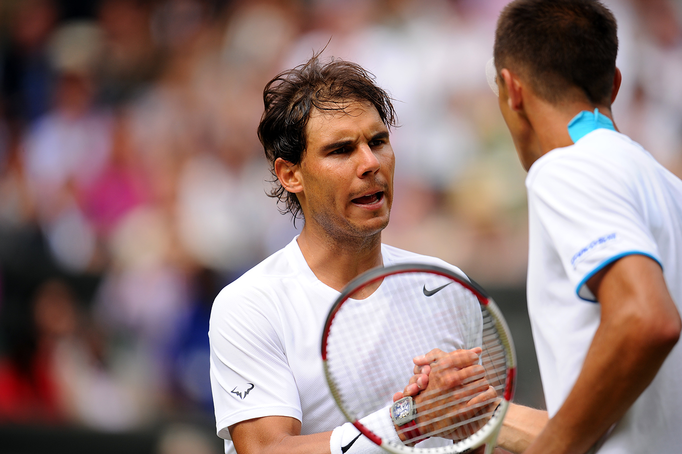 Rafael Nadal and Lukas Rosol shake hands on Centre Court 