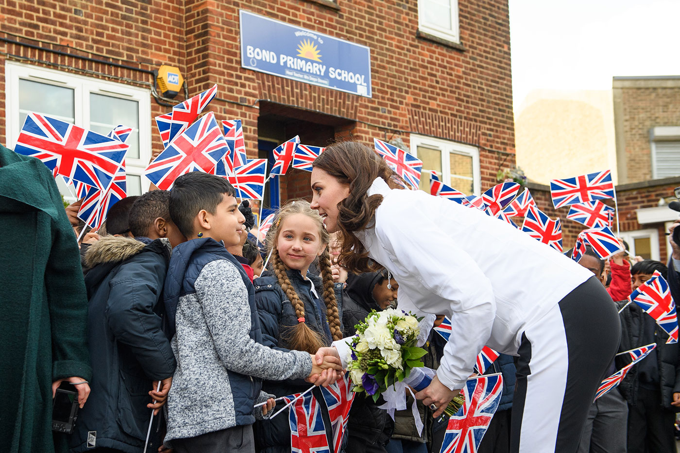 The Duchess of Cambridge is welcomed to Bond Primary School