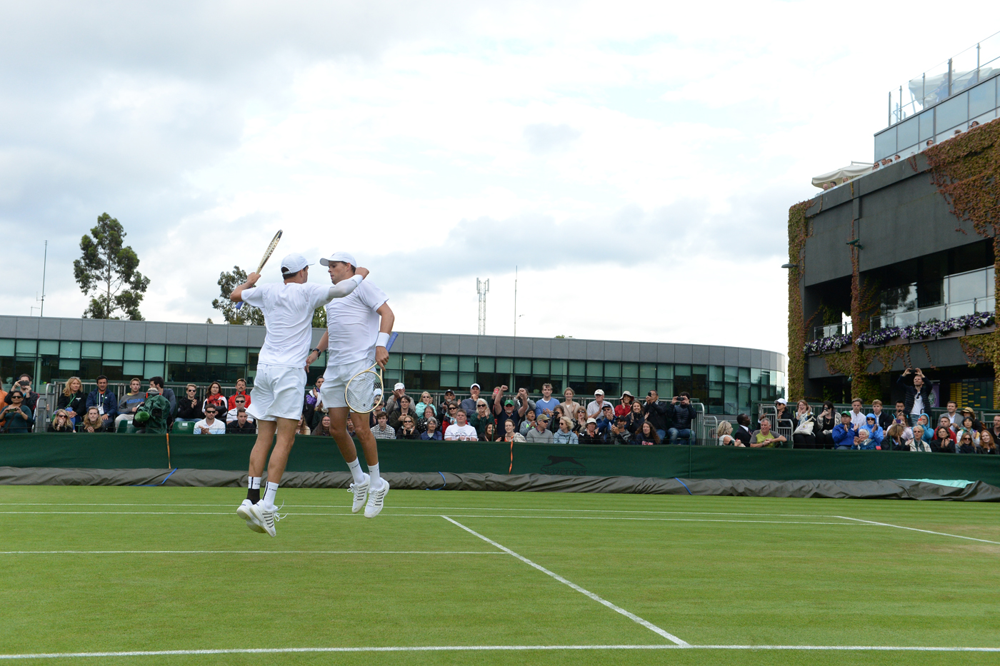 Brothers Mike and Bob Bryan perform their signature chest bump