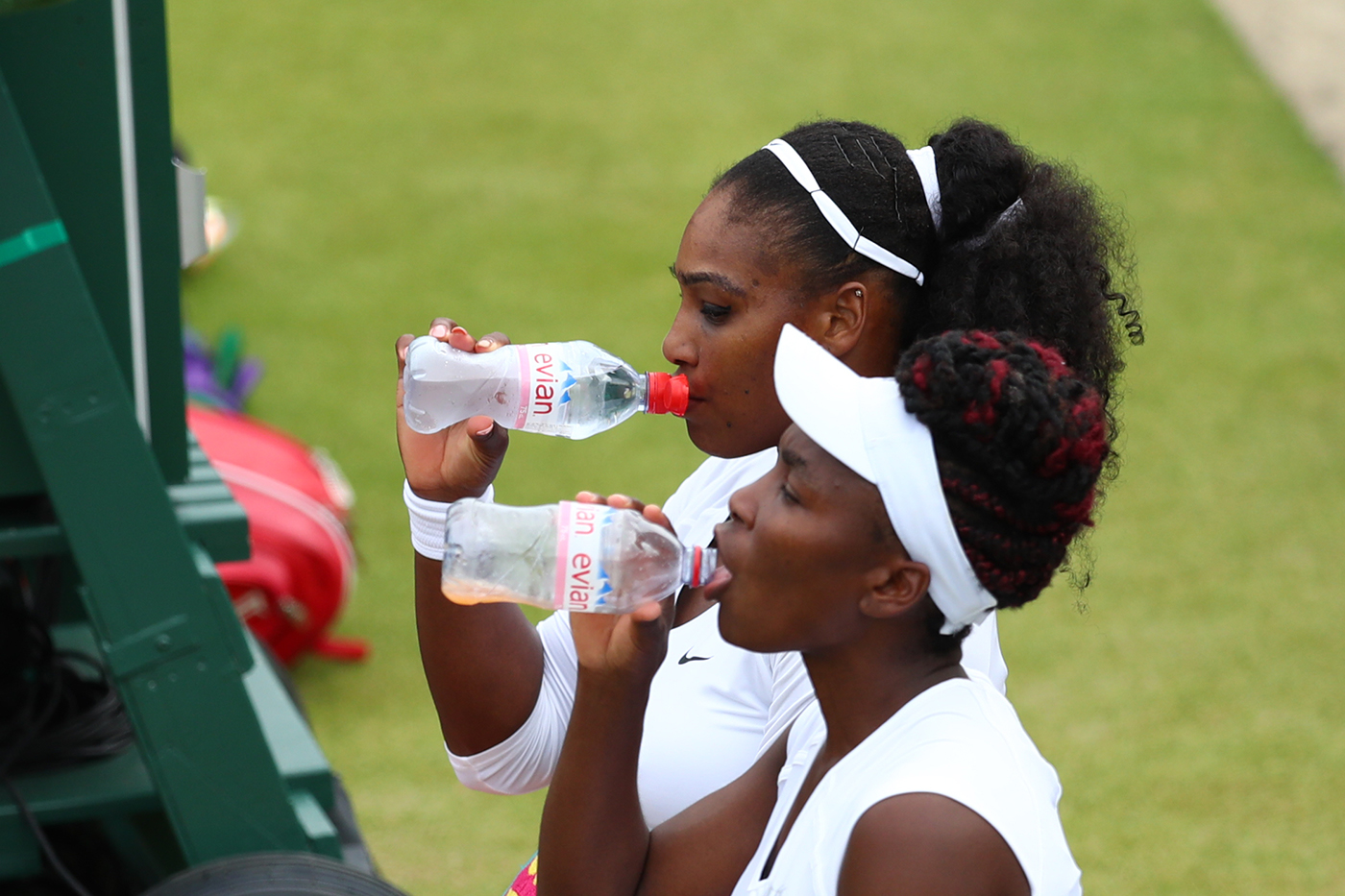 Williams sisters continue advance