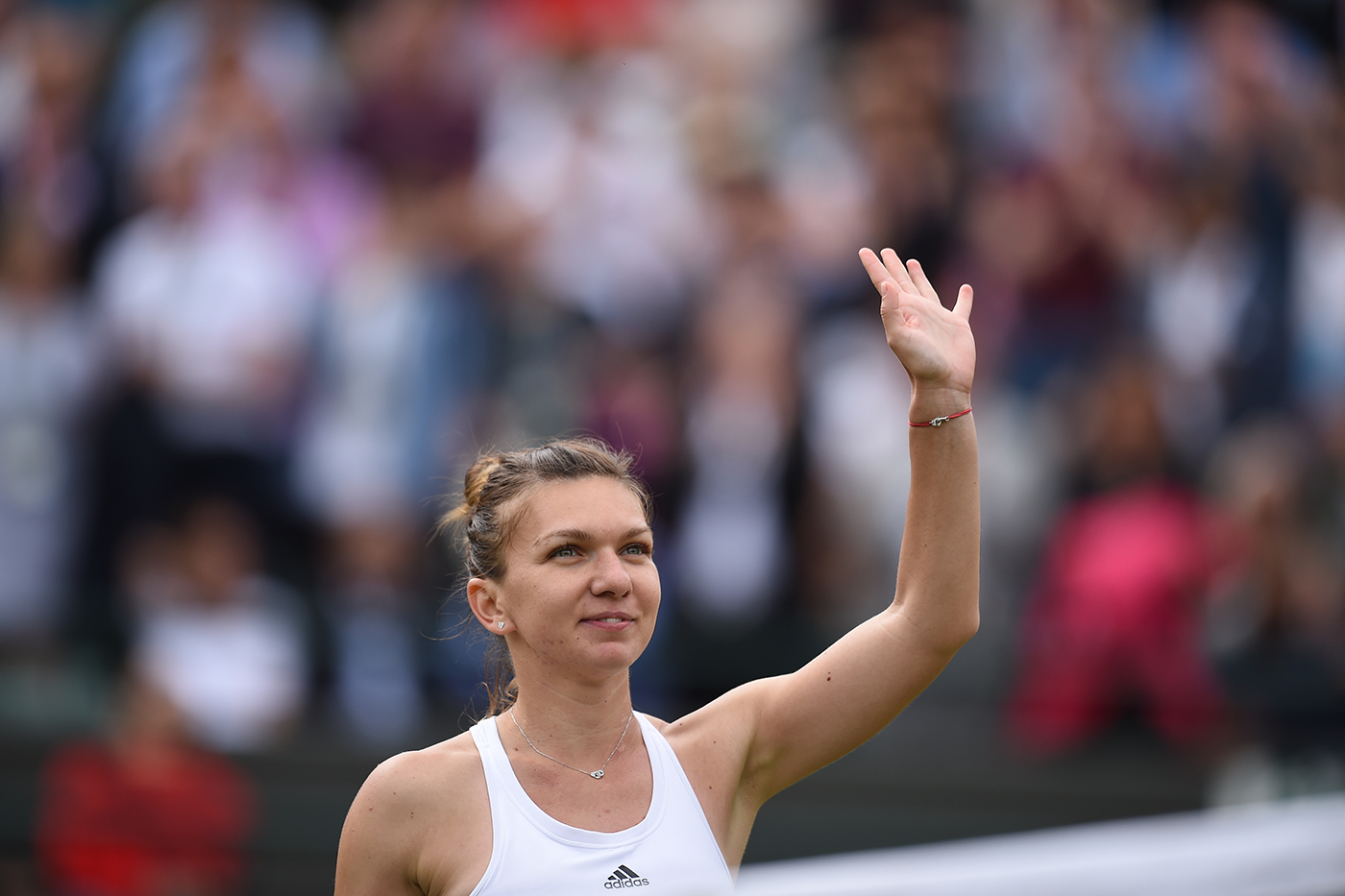 Halep takes scenic route to quarter-finals
